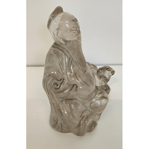 44 - 18thC Chinese carved rock crystal Buddha /Wiseman with seated dog. H 10.5cm W 11cm.