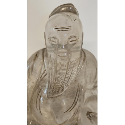 44 - 18thC Chinese carved rock crystal Buddha /Wiseman with seated dog. H 10.5cm W 11cm.