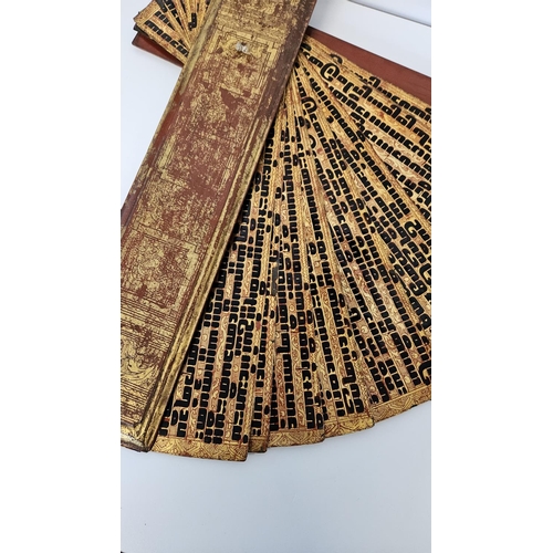 46 - 19thC Burmese Gilt Lacquered Kammavaca Manuscript composed of sixteen red lacquered and gilded ename... 