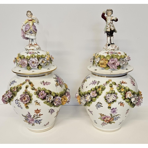 37 - Pair of Fine Dresden Flower encrusted lidded jars with Regency figure finials decorated with hand pa... 