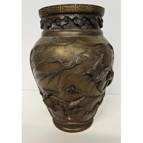 51 - Pair of Japanese Meiji period Bronze parcel glit high relief vases decorated with Storks and rocky o... 