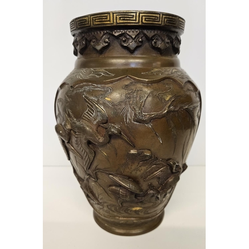 51 - Pair of Japanese Meiji period Bronze parcel glit high relief vases decorated with Storks and rocky o... 