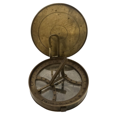 69 - Late 18thC Equinoctial sundial clock in turned and engraved brass. 76mm in Diameter