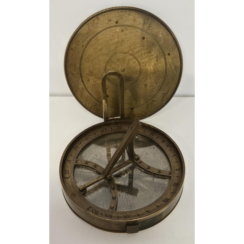 69 - Late 18thC Equinoctial sundial clock in turned and engraved brass. 76mm in Diameter