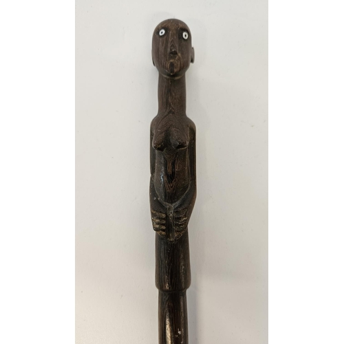 53 - 2 South African Hardwood walking canes the handle carved with a mans head and torso (L 89cm) and sim... 