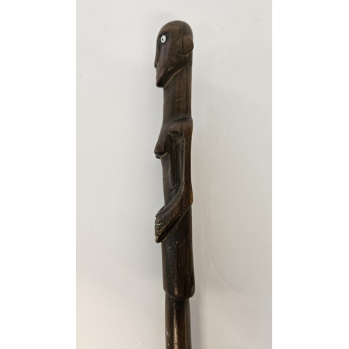 53 - 2 South African Hardwood walking canes the handle carved with a mans head and torso (L 89cm) and sim... 