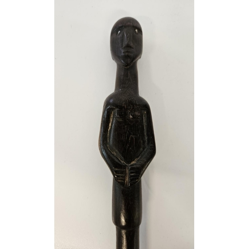 53 - 2 South African Hardwood walking canes the handle carved with a mans head and torso (L 89cm) and sim... 