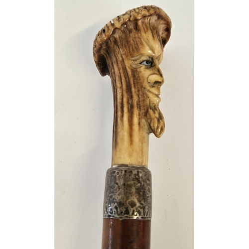 78 - 19thC Antler topped walking Cane with carved bearded face over Silver Collar and tapering fruitwood ... 