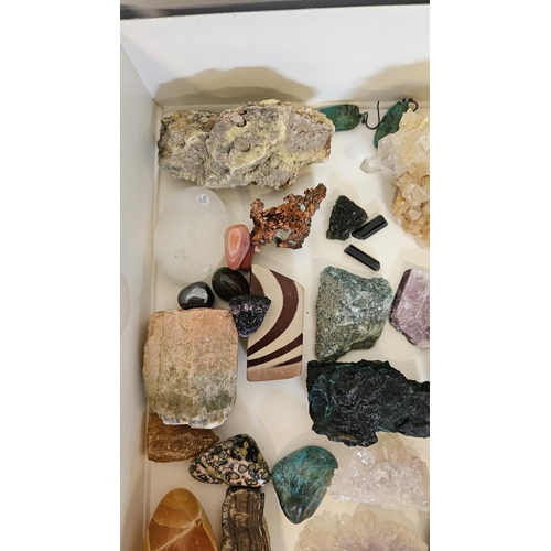 89 - A collection of mineral specimens, including Jasper, Rainbow Flourite, Himalayan Smoky Quartz, Amber... 