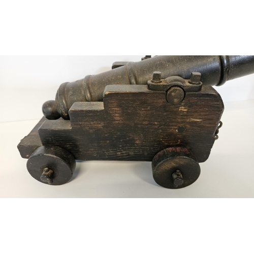 94 - Fine Quality Model of a British Naval Napoleonic era Cannon in cast iron, mounted on oak carriage. 4... 