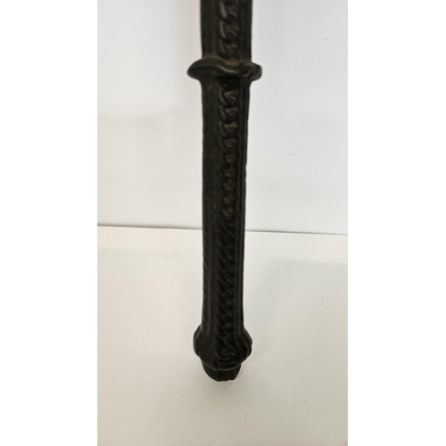 97 - Medieval Ottoman style cast iron war axe with eastern script and figural motif to axe head. 55cm in ... 