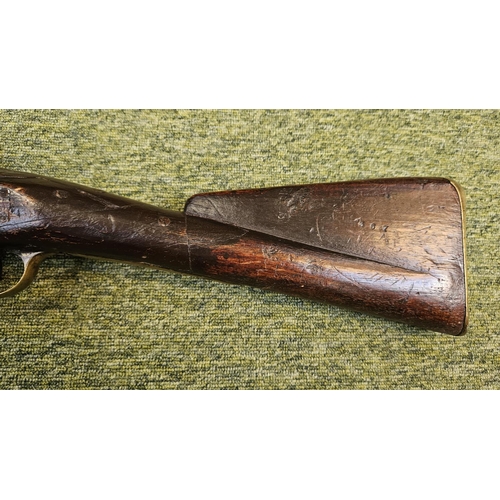 99 - An Early 19th flintlock musket rifle possible East Indian company, the action stamped, the walnut st... 