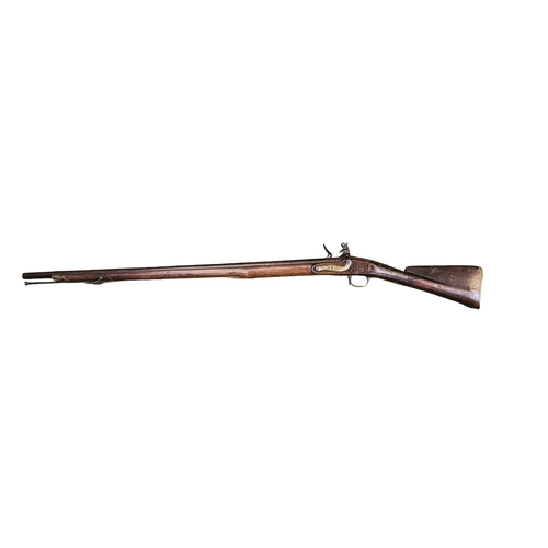 99 - An Early 19th flintlock musket rifle possible East Indian company, the action stamped, the walnut st... 