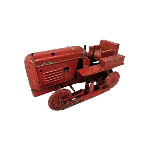 91 - A Rare Shackleton Toys Mechanical David Brown Trackmaster 30 Tractor with Red body, produced in 1952... 