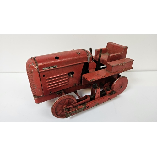 91 - A Rare Shackleton Toys Mechanical David Brown Trackmaster 30 Tractor with Red body, produced in 1952... 