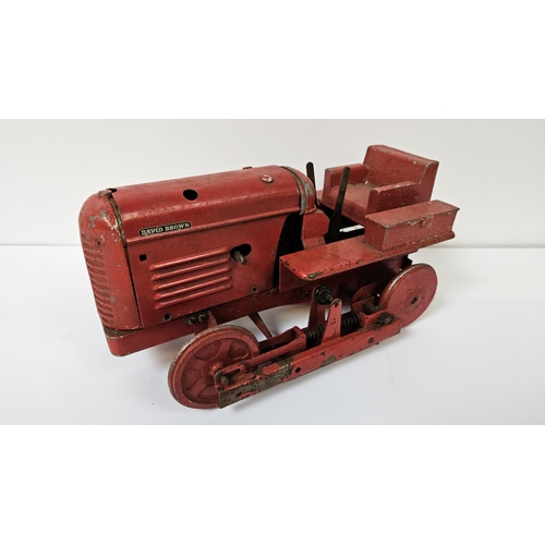 91 - A Rare Shackleton Toys Mechanical David Brown Trackmaster 30 Tractor with Red body, produced in 1952... 