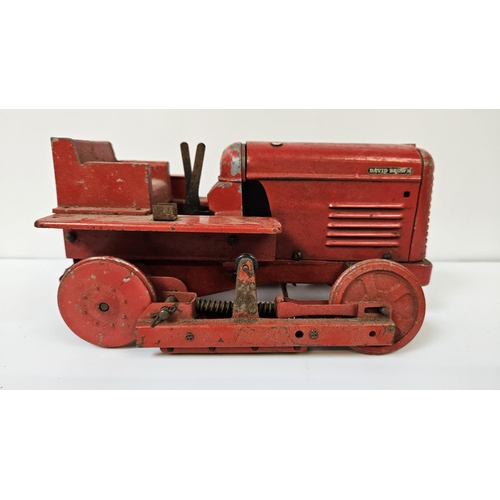 91 - A Rare Shackleton Toys Mechanical David Brown Trackmaster 30 Tractor with Red body, produced in 1952... 