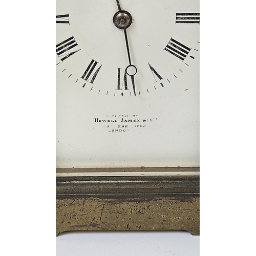 102 - Howell James of London Brass Carriage clock with roman numeral dial, complete with key. 16cm in Heig... 