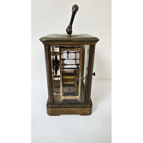 102 - Howell James of London Brass Carriage clock with roman numeral dial, complete with key. 16cm in Heig... 