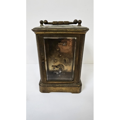 102 - Howell James of London Brass Carriage clock with roman numeral dial, complete with key. 16cm in Heig... 