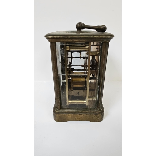 102 - Howell James of London Brass Carriage clock with roman numeral dial, complete with key. 16cm in Heig... 