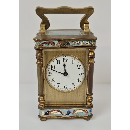 103 - A French Gilt Brass and Champleve enamel miniature carriage clock with enamel dial inscribed made in... 