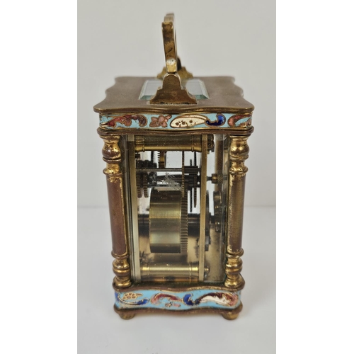 103 - A French Gilt Brass and Champleve enamel miniature carriage clock with enamel dial inscribed made in... 