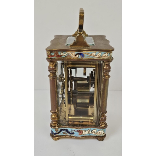 103 - A French Gilt Brass and Champleve enamel miniature carriage clock with enamel dial inscribed made in... 