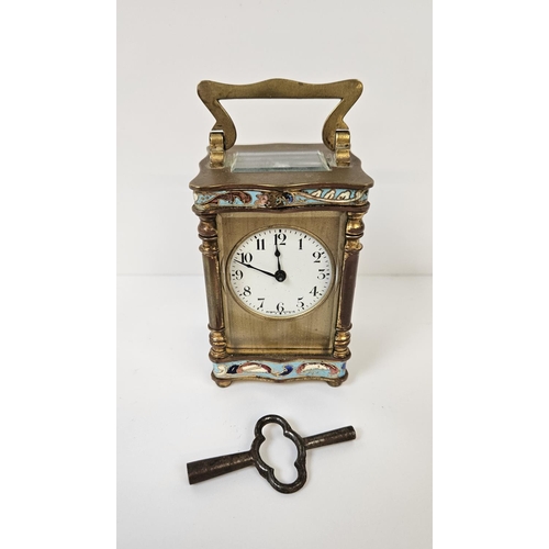 103 - A French Gilt Brass and Champleve enamel miniature carriage clock with enamel dial inscribed made in... 