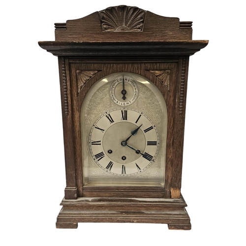 104A - Gustav Becker Late 19th Oak Cased Bracket clock with Silvered Roman numeral dial and glazed door. 42... 