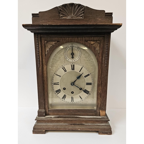 104A - Gustav Becker Late 19th Oak Cased Bracket clock with Silvered Roman numeral dial and glazed door. 42... 