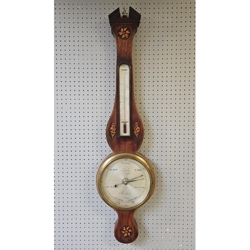 104B - A 19thC Anthony Gatty mahogany and marquetry wheel barometer, with silvered dials, the 8.5inch main ... 