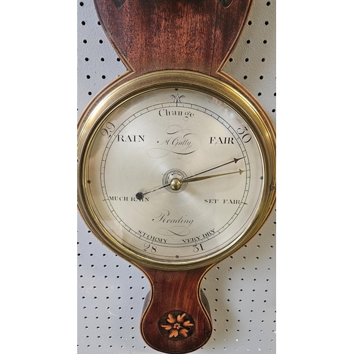 104B - A 19thC Anthony Gatty mahogany and marquetry wheel barometer, with silvered dials, the 8.5inch main ... 