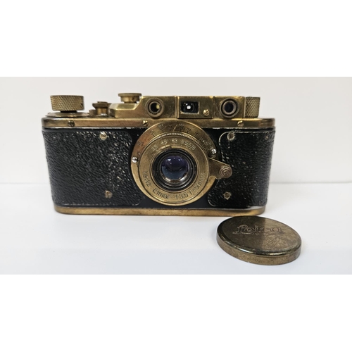 86 - A Russian copy of a German Luftwaffe Leica , manufactured by Zorki, with Luftwaffe engravings and se... 