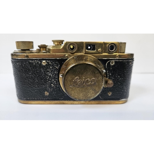 86 - A Russian copy of a German Luftwaffe Leica , manufactured by Zorki, with Luftwaffe engravings and se... 