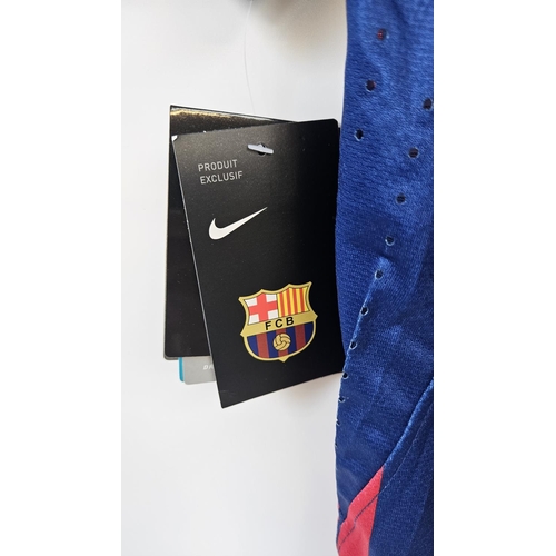 151 - LIONEL MESSI 2011/12 SIGNED #10 BARCELONA JERSEY The striped red and blue Barcelona jersey was signe... 