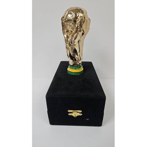 155 - 2002 FIFA WORLD CUP FIVE-TIMES WINNER TROPHY
A miniature trophy in the image of the original FIFA Wo... 