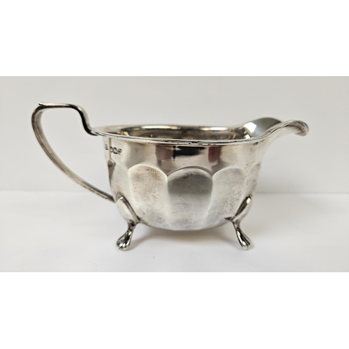 180 - Mid 20thC Silver 3 Piece Tea set with Ebony handle and knop supported on paw feet, Sheffield 1946. 9... 