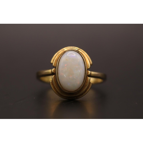 190 - Ladies 9ct Gold Oval Opal set ring. Rub over set Opal 11mm x 8mm. Size O. 3.8g total weight