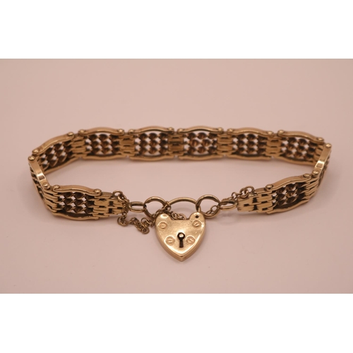 193 - Fine Ladies pierced Gate bracelet with padlock clasp and safety chain. 18cm in Length. 26g total wei... 