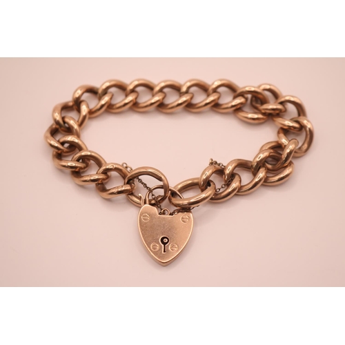 197 - Large Edwardian Ladies 9ct Gold Hollow link gate bracelet with padlock clasp and safety chain. 180mm... 