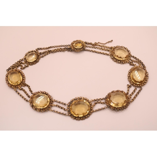 206 - Fine Victorian Citrine gold mounted graduated Riviera necklace. The necklace composed of 8 oval-cut ... 