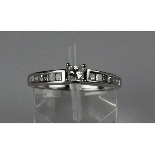 222 - 14ct white gold solitaire diamond ring, four-claw set with a princess cut diamond to the centre, wit... 