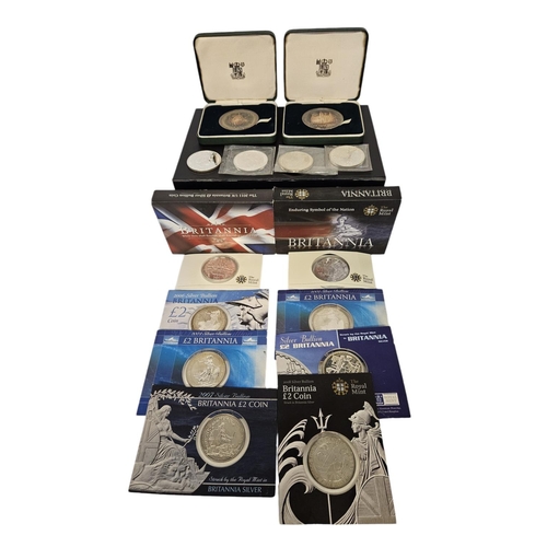 176 - Collection of 14 Silver Coins to include Twelve Silver Britannia Coins in packaging and 2 Cased Roya... 