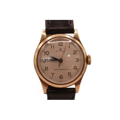 227 - Rolex 1950s 9ct Gold 30mm wristwatch with Silvered matte face, raised gold coloured numeral dial wit... 