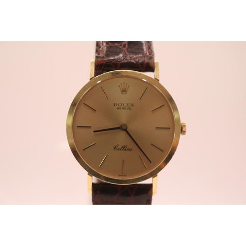 228 - Rolex Geneve Cellini 9ct Gold wristwatch with Gilded face and baton dial and manual winding movement... 