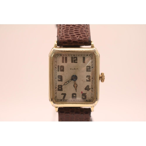 229 - Elgin of USA 1930s Tank 14K Gold Filled wristwatch with numeral dial and engraved case. 24mm Case.