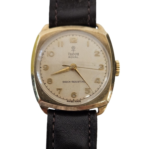 241 - Rolex Tudor 9ct Gold Hand winding wristwatch with numeral dial in cushion shaped case. 26mm case.