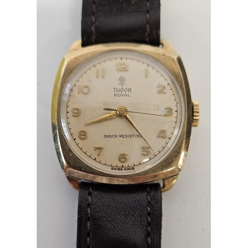 241 - Rolex Tudor 9ct Gold Hand winding wristwatch with numeral dial in cushion shaped case. 26mm case.