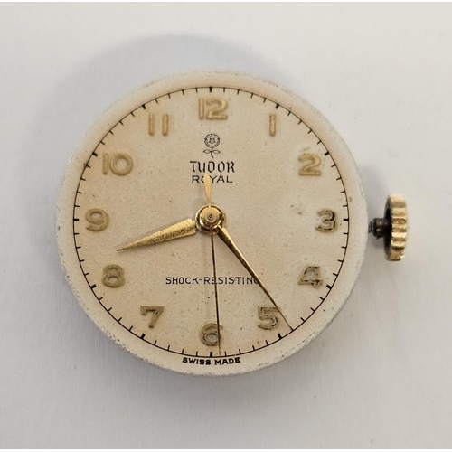 241 - Rolex Tudor 9ct Gold Hand winding wristwatch with numeral dial in cushion shaped case. 26mm case.